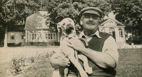 Supercoat - Man carrying a dog