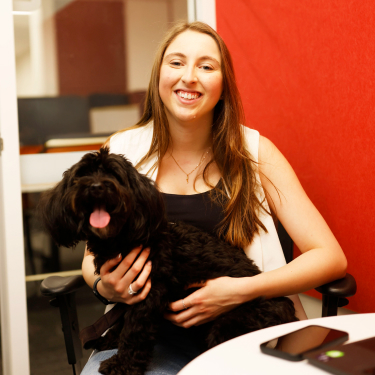 Purina staff member with her dog